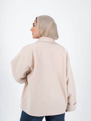 Beige TOKYO Oversized Jacket by THT GIRL, styled with a relaxed fit, featuring wide lapels and casual fashion design.