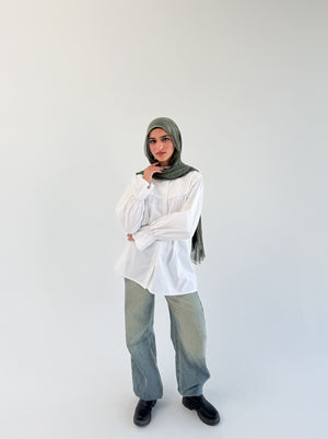 White Lady Blouse by THT GIRL, showcasing a stylish, feminine top with elegant design and lightweight fabric.