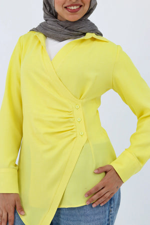 Yellow shirt featuring a deer print from THT GIRL, casual style, displayed on a hanger.