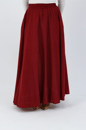 THT GIRL Riviera burgundy skirt paired with a stylish blouse, showcasing a fashionable and elegant outfit.
