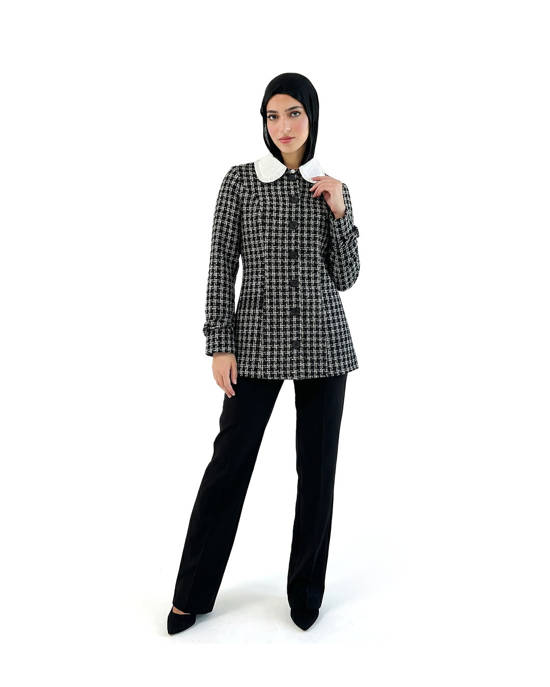 Black Paris Blouse by THT GIRL featuring a stylish, flowy design with long sleeves and a high neckline.