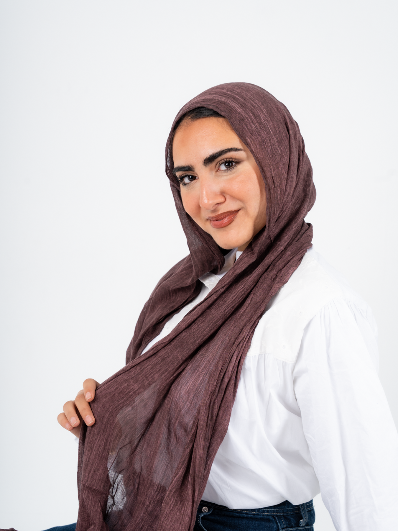 THT GIRL Ready To Go burgundy hijab made of soft fabric, styled as a simple, elegant head covering for modest fashion.