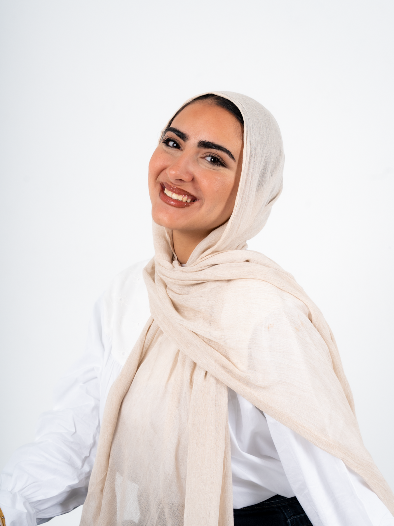 White ready-to-go hijab by THT GIRL, neatly folded fabric in soft sugar white color for stylish modest wear.