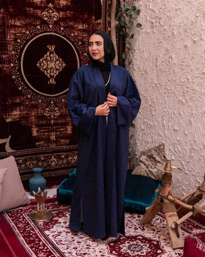 Navy Samaa Kaftan by THT GIRL featuring flowing fabric and elegant design, perfect for stylish fashion occasions.