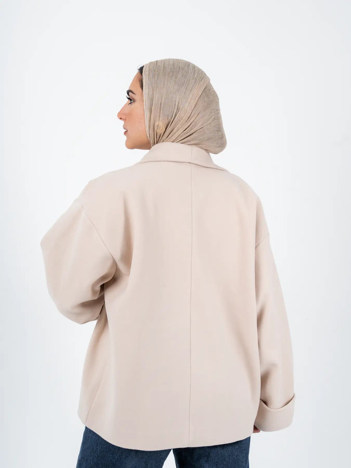 Beige TOKYO Oversized Jacket by THT GIRL, styled with a relaxed fit, featuring wide lapels and casual fashion design.