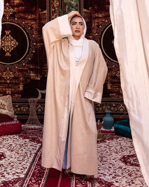 Beige Samaa Kaftan by THT GIRL featuring elegant flowy fabric and intricate patterns, perfect for stylish fashion wear.
