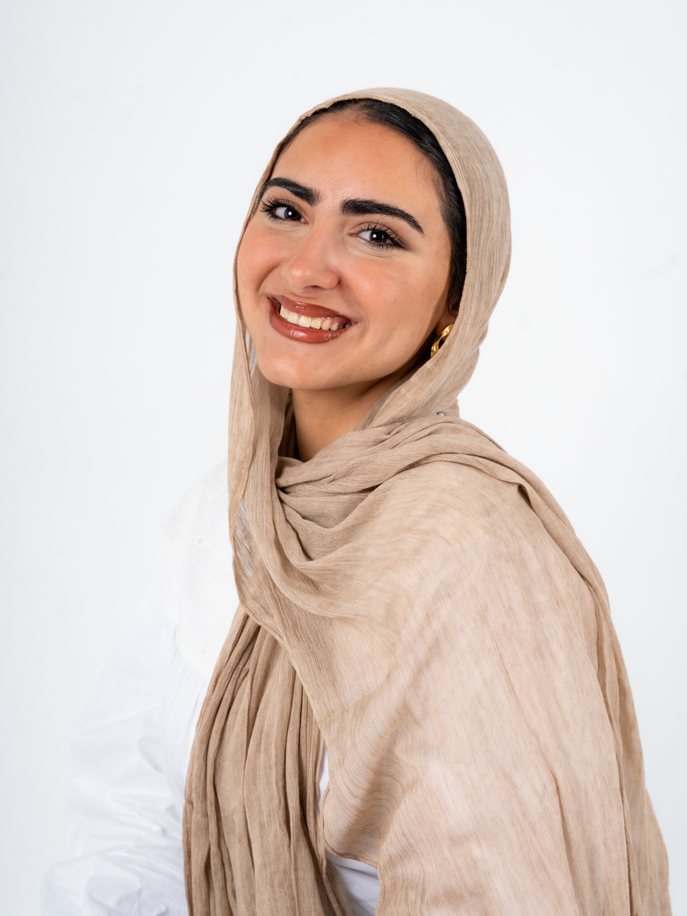 Ready To Go hijab in latte color by THT GIRL, stylish and comfortable modest headscarf displayed on a model.