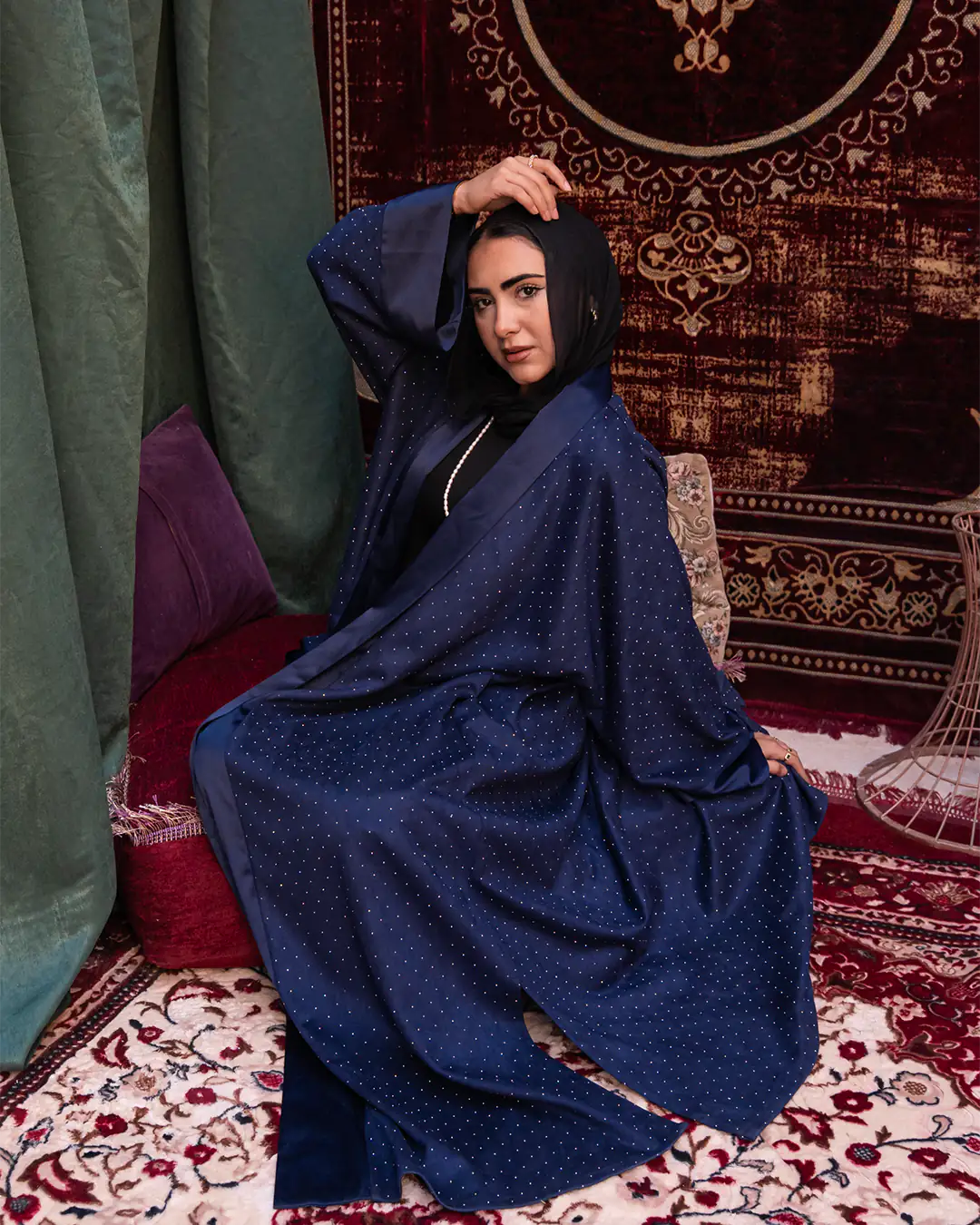 Navy Samaa Kaftan by THT GIRL featuring flowing fabric and intricate embroidery for stylish fashion wear.