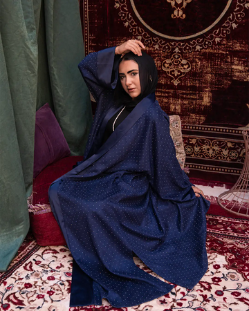 Navy Samaa Kaftan by THT GIRL featuring flowing fabric and intricate embroidery for stylish fashion wear.