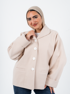 Beige TOKYO Oversized Jacket by THT GIRL, stylish fashion outerwear displayed on a hanger.