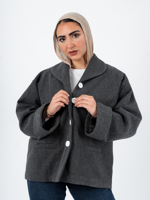 THT GIRL Tokyo oversized grey jacket displayed on a hanger, featuring a relaxed fit and trendy fashion style.