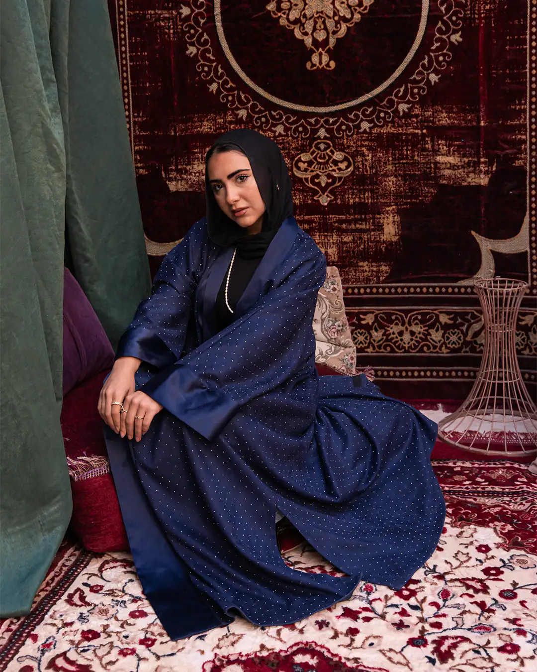 Navy Samaa Kaftan by THT GIRL featuring flowing fabric and intricate embroidery for stylish fashion wear.