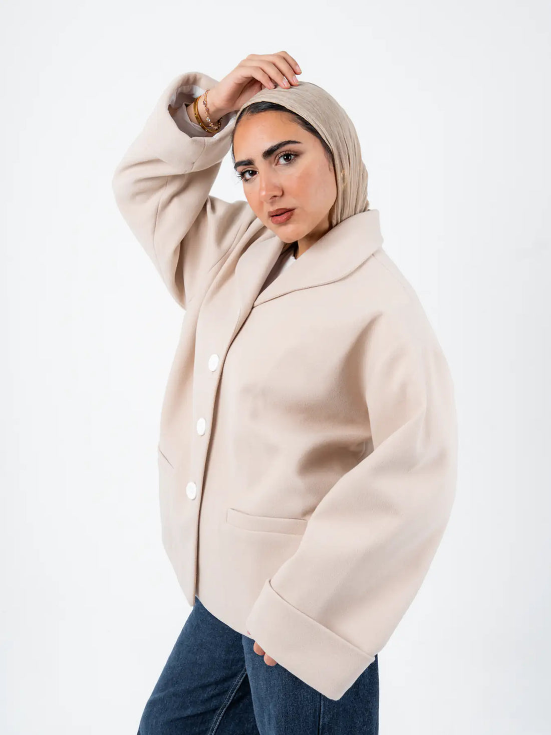 Beige TOKYO oversized jacket by THT GIRL displayed on a model, showcasing its relaxed fit and stylish design.