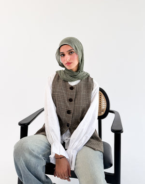 Olive check London vest by THT GIRL featuring a tailored fit and classic check pattern, displayed on a hanger.