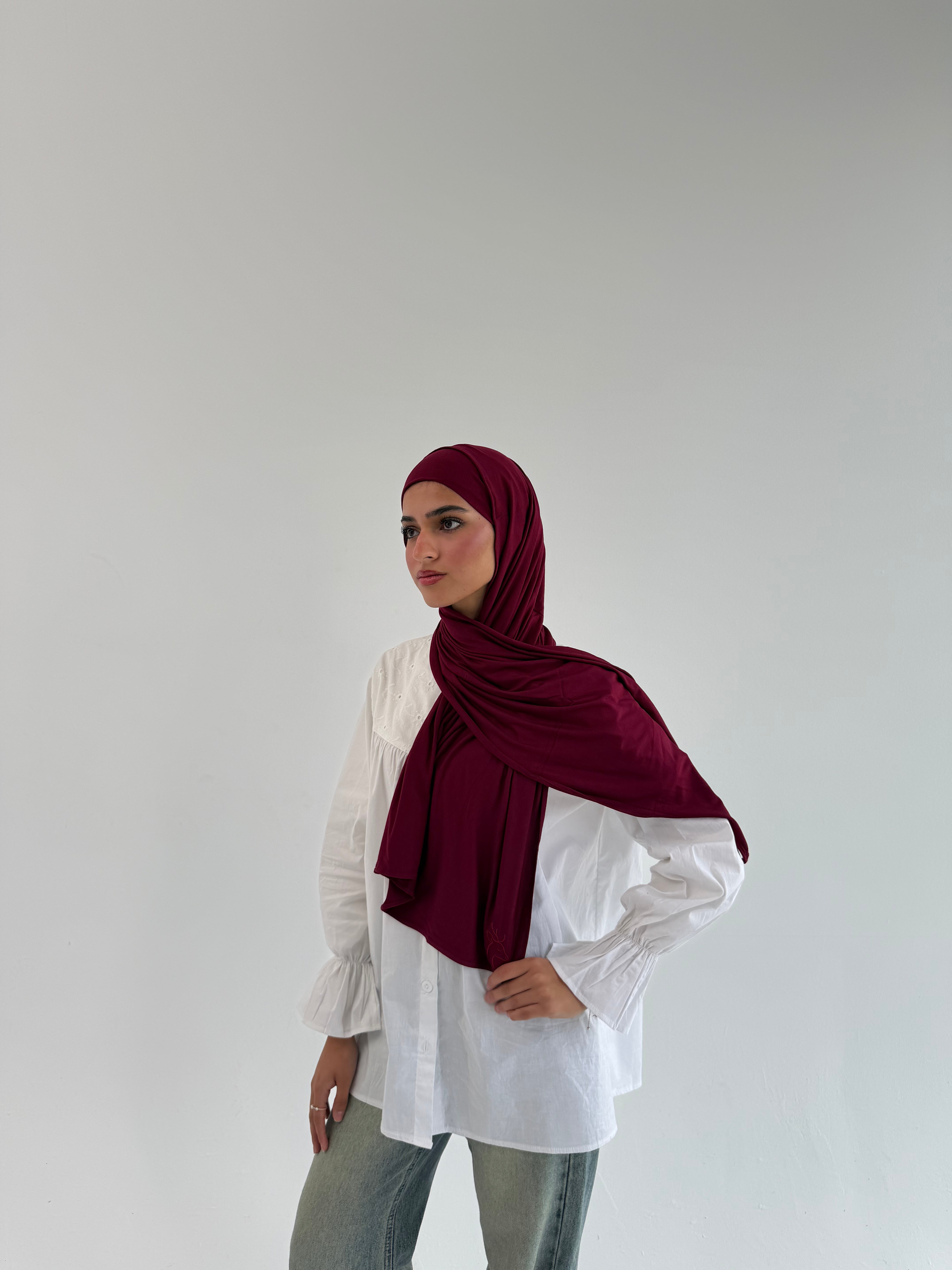 Burgundy mini everyday hijab by THT GIRL, lightweight and stylish headscarf for daily wear, shown on a mannequin.