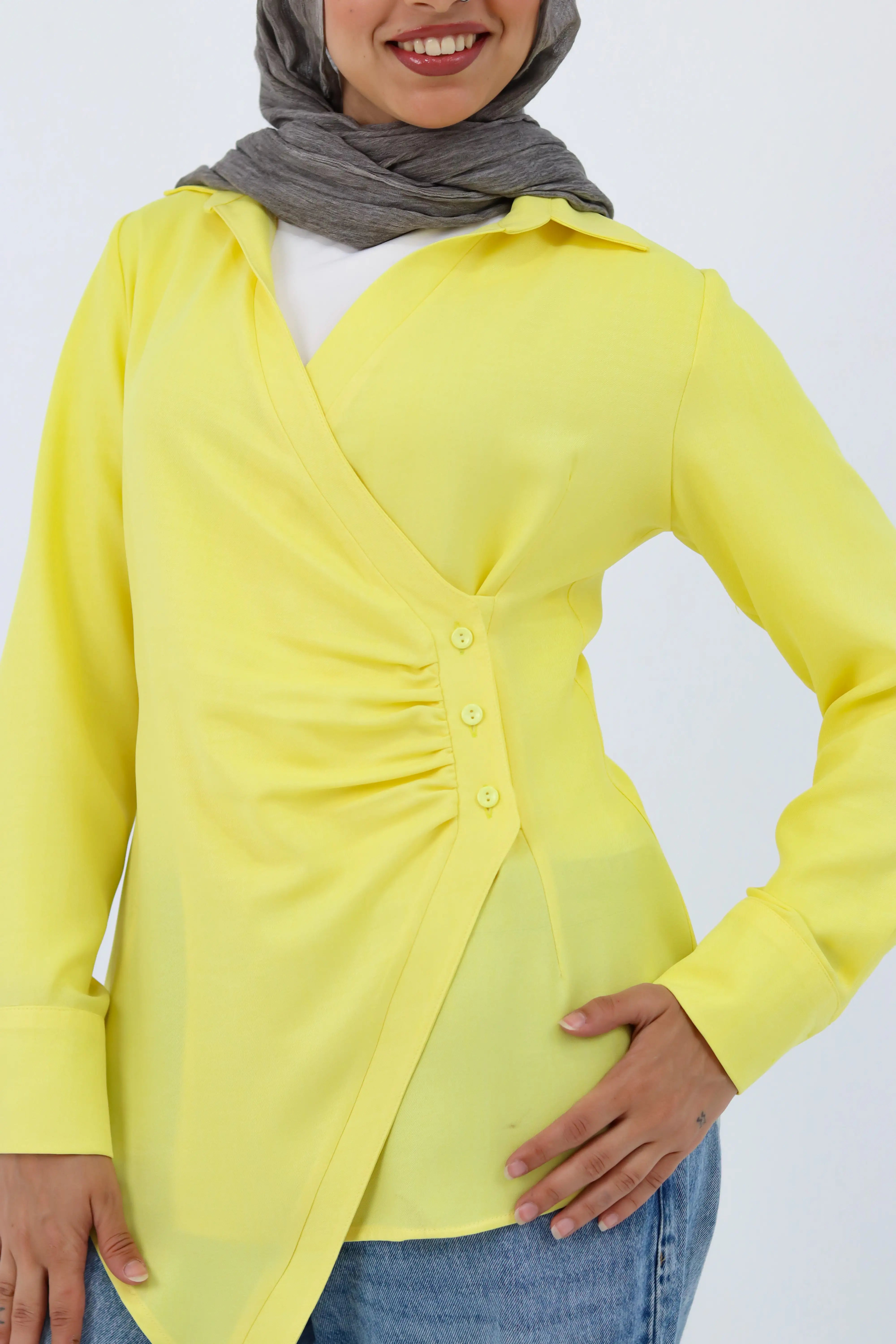 Yellow shirt featuring a deer print from THT GIRL, casual style, displayed on a hanger.