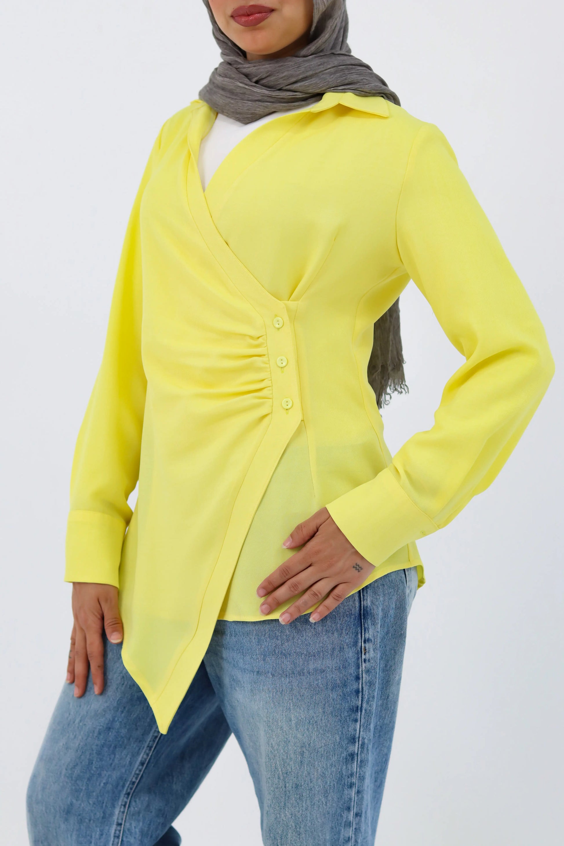 Yellow THT GIRL deer graphic shirt displayed on a hanger with a plain background.