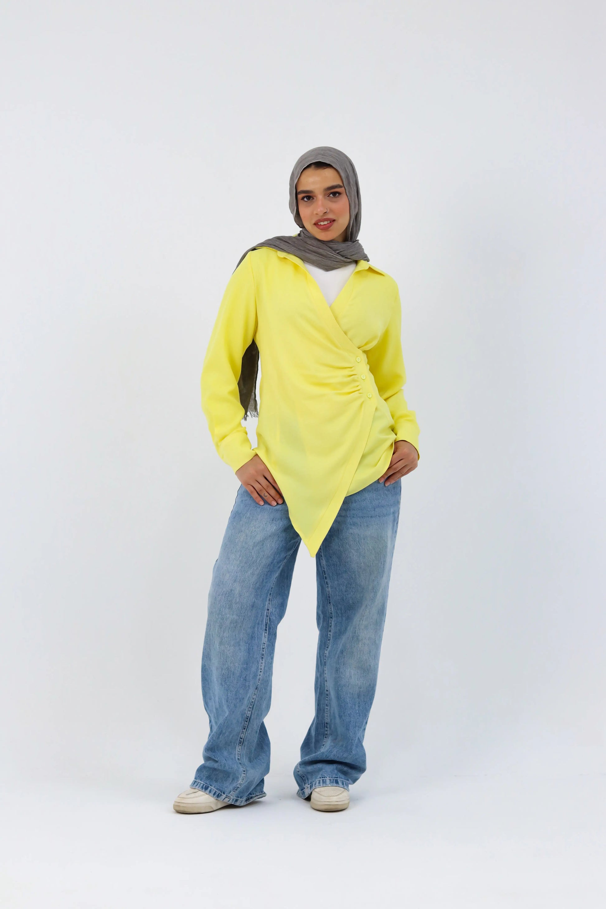 Yellow deer print shirt by THT GIRL featuring a playful deer design on a bright yellow fabric.