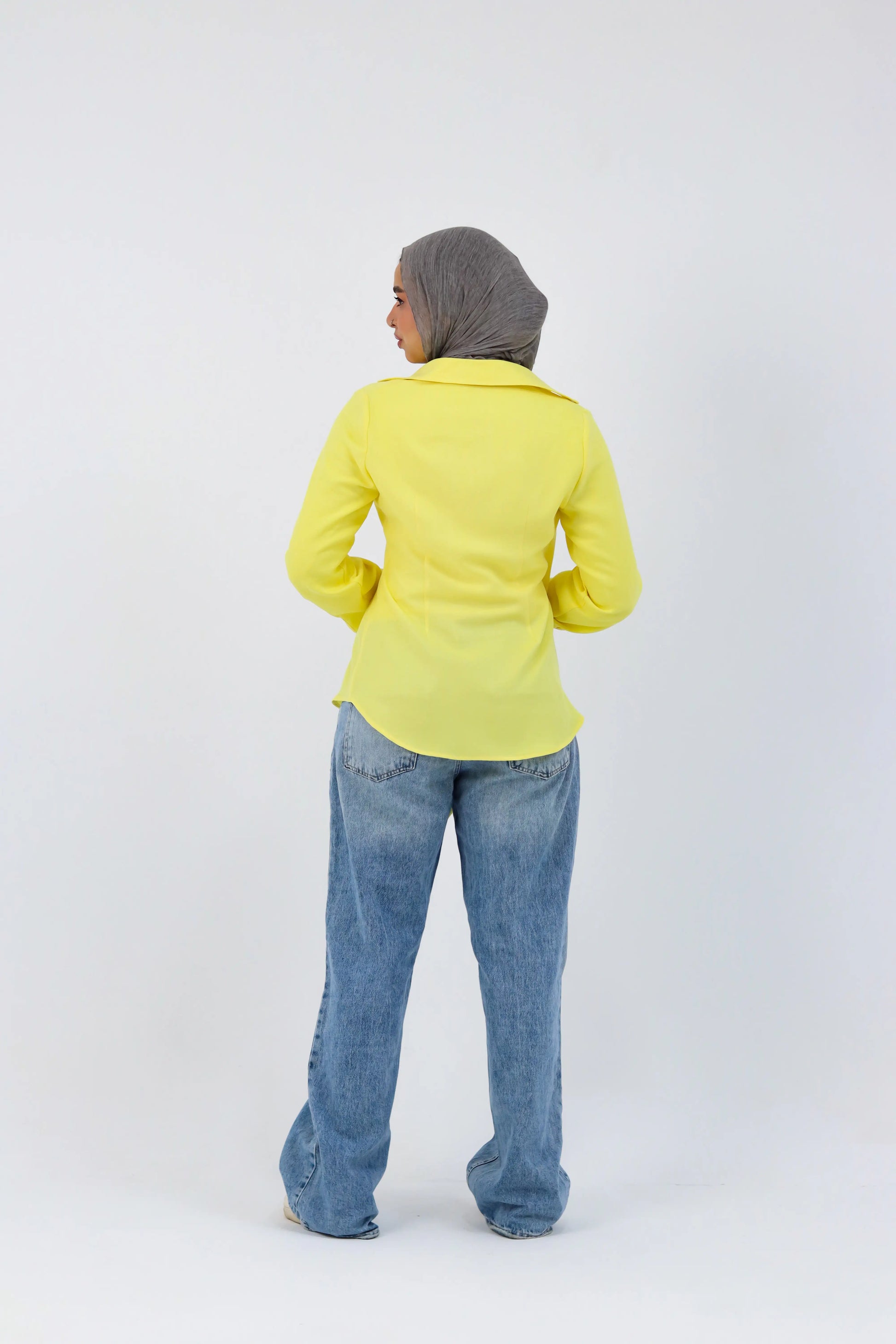 Yellow shirt featuring a deer print from THT GIRL, casual short-sleeve top with a relaxed fit, shown on a hanger.