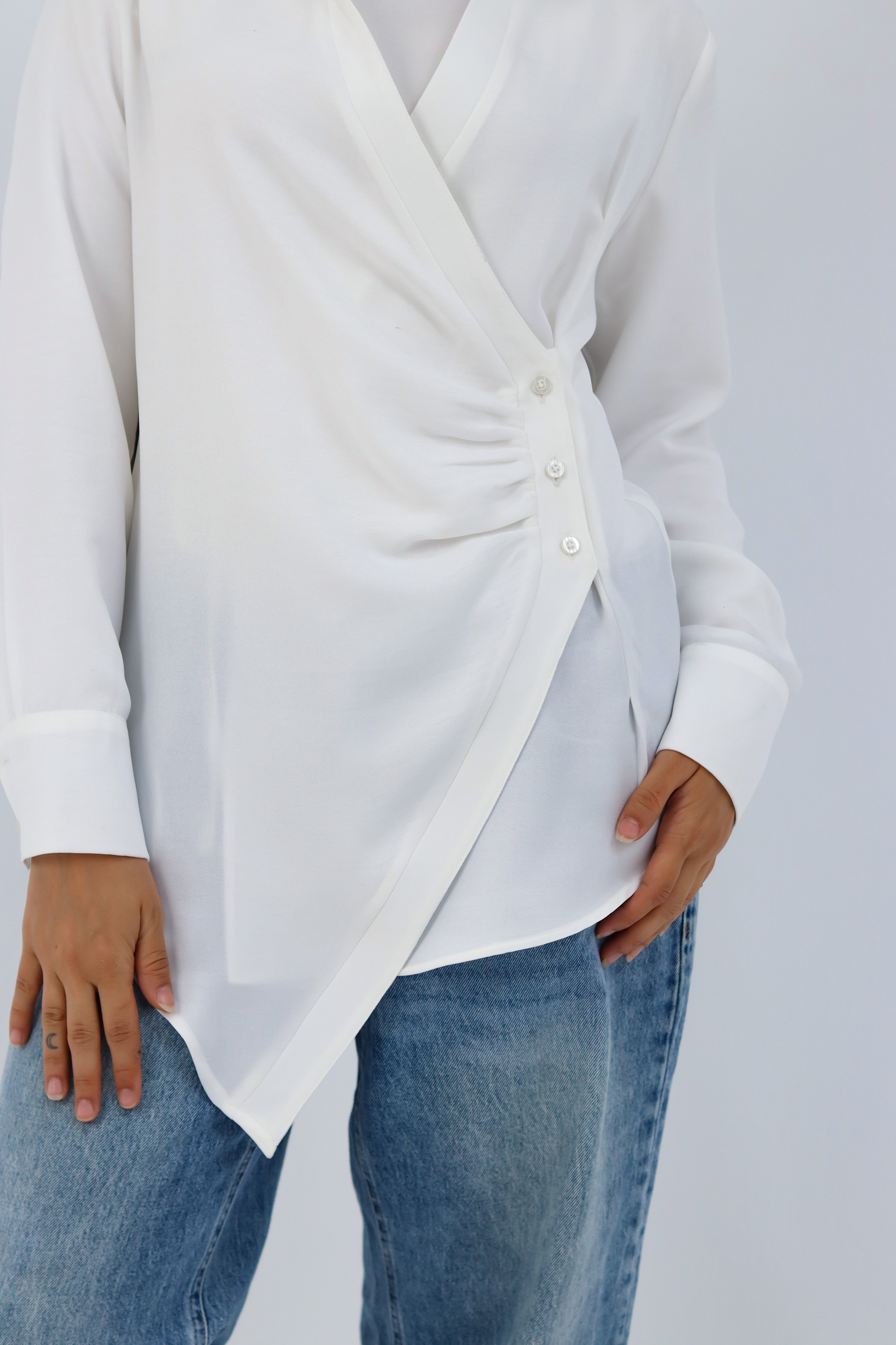 White deer print shirt by THT GIRL, featuring a casual fit and button-down style, displayed on a hanger.