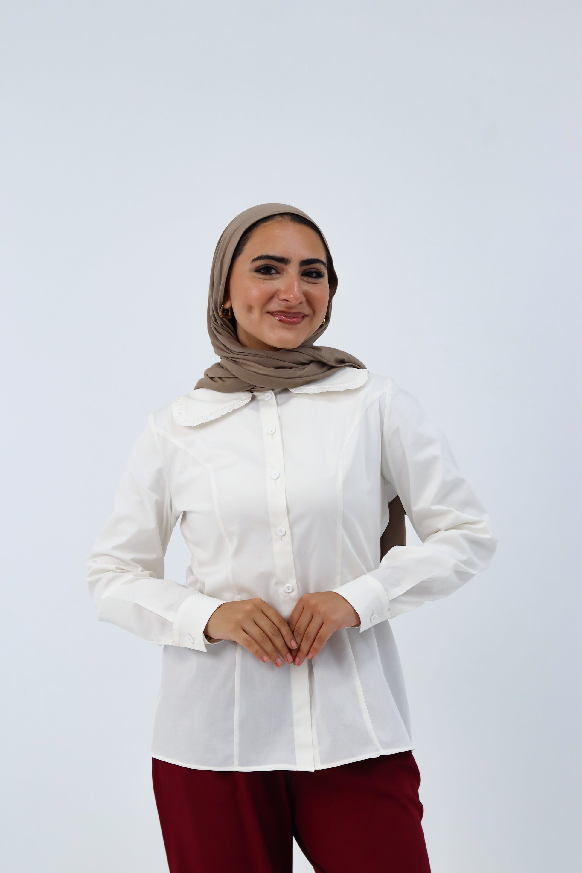 White Paris Blouse by THT GIRL, summer-ready blouse with lightweight fabric and stylish design, displayed on a hanger.