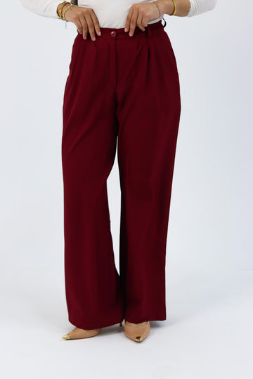 THT GIRL burgundy loose pants with relaxed fit, featuring soft fabric and casual style, shown on a model.