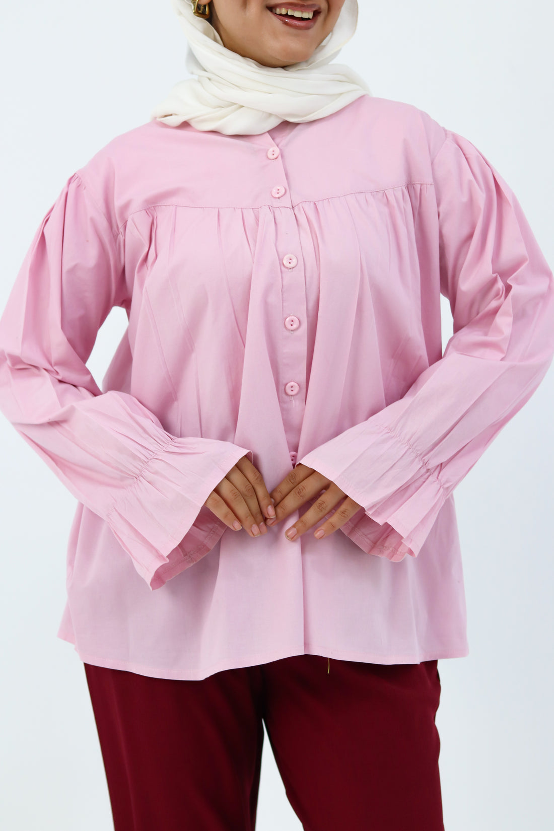 Baby pink blouse by THT GIRL featuring a stylish, feminine design and lightweight fabric, perfect for casual or dressy occasions.