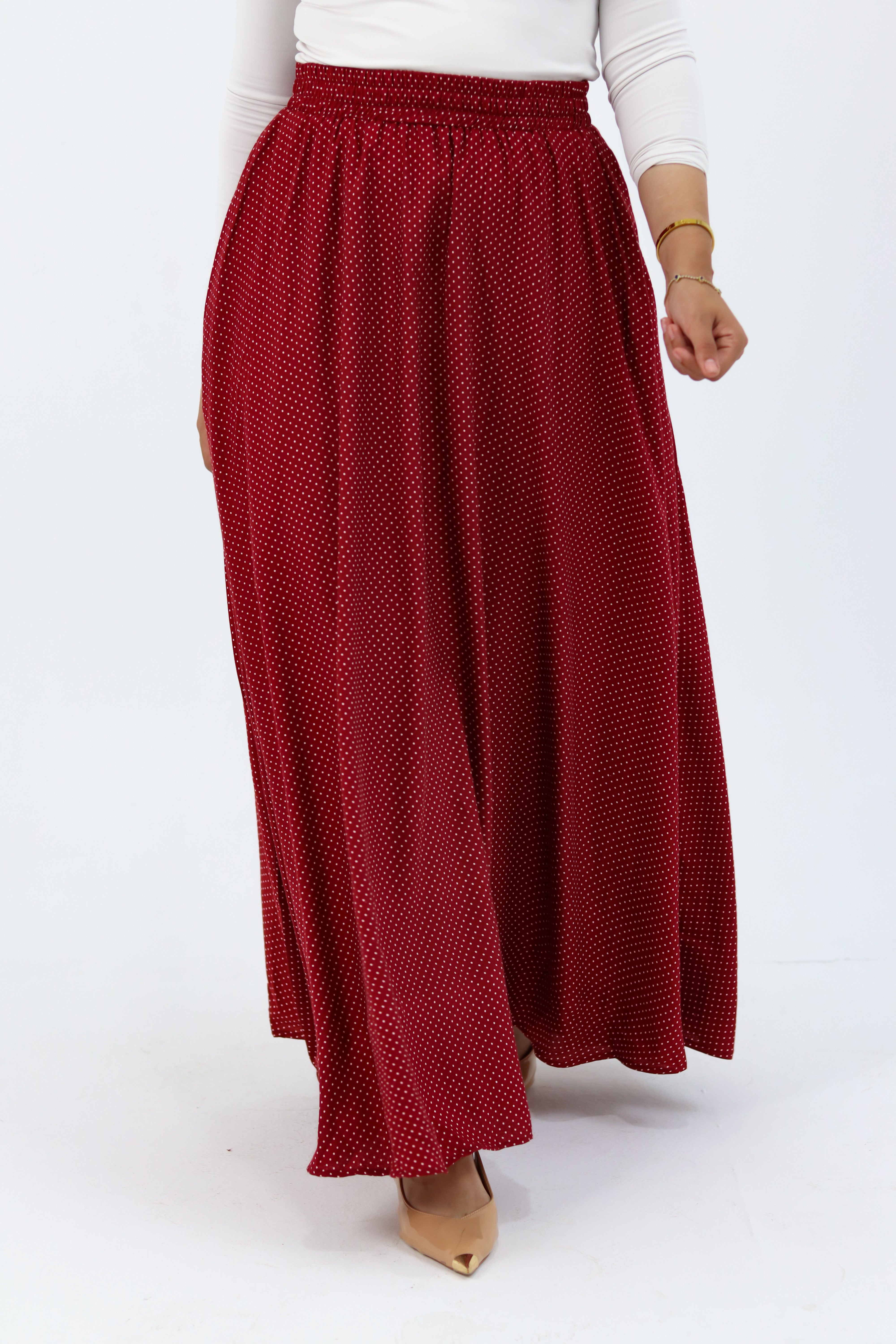 THT GIRL Riviera burgundy skirt with a stylish blouse, featuring a fitted design and elegant fabric, perfect for casual or dressy occasions.