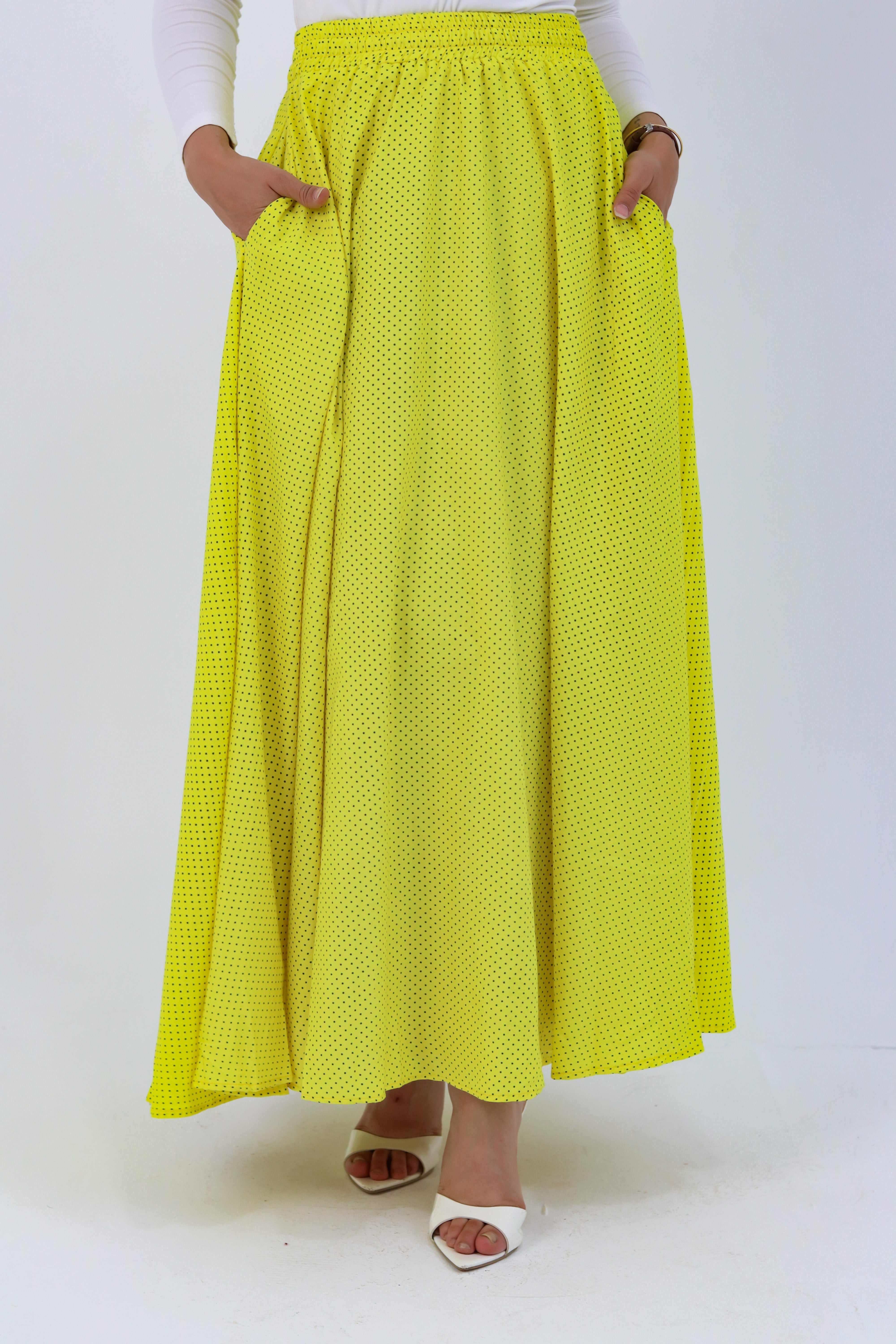 Yellow Riviera skirt paired with a stylish blouse, featuring vibrant color and trendy design by THT GIRL.