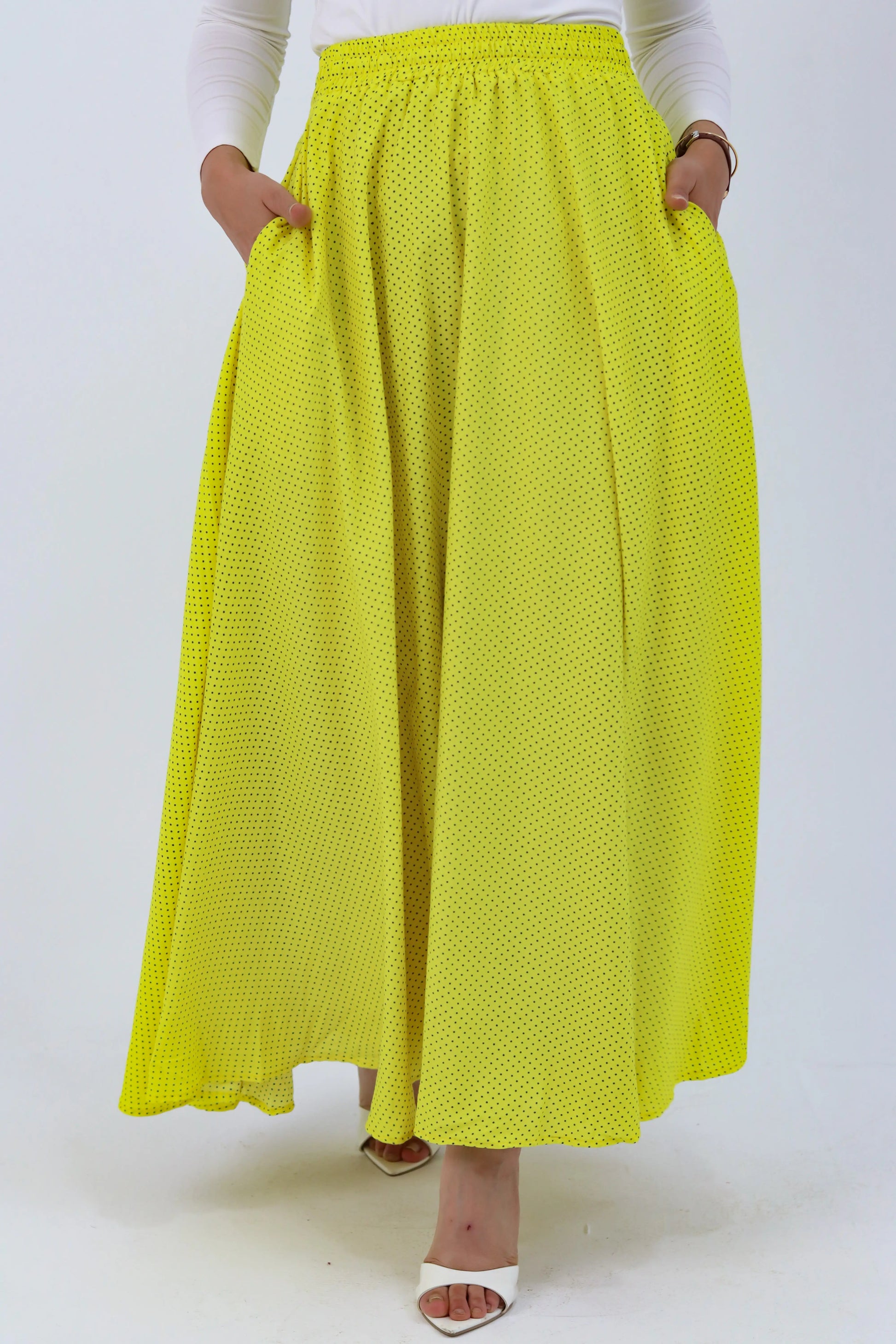 Yellow Riviera skirt from THT GIRL paired with a blouse, shown in image IMG_5472.