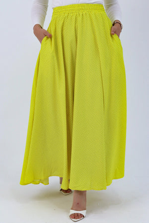 Yellow Riviera skirt from THT GIRL paired with a blouse, shown in image IMG_5472.