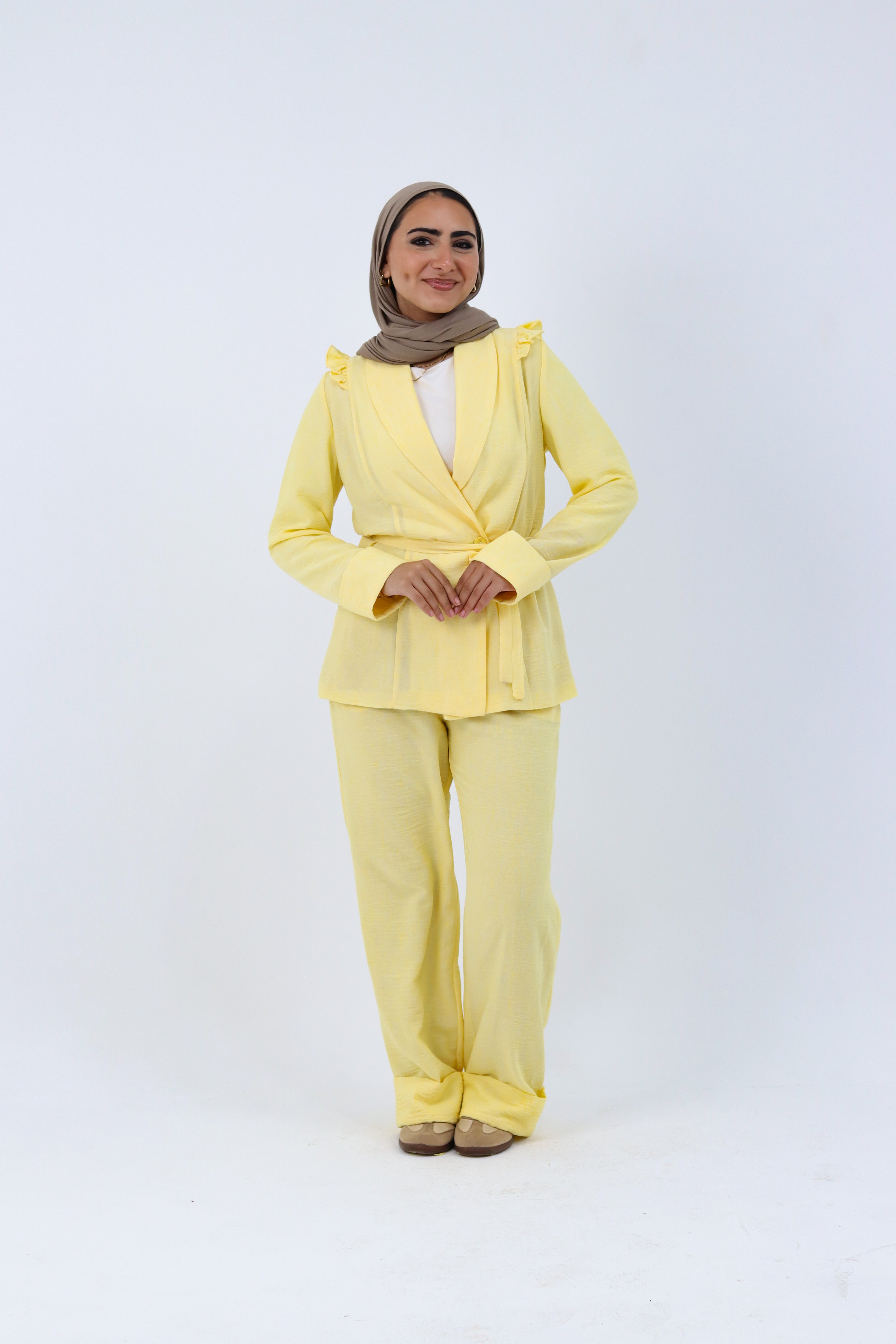 Yellow Roe Suit by THT GIRL, stylish fashion jumpsuit, with a fitted design and vibrant yellow color, displayed on a model.
