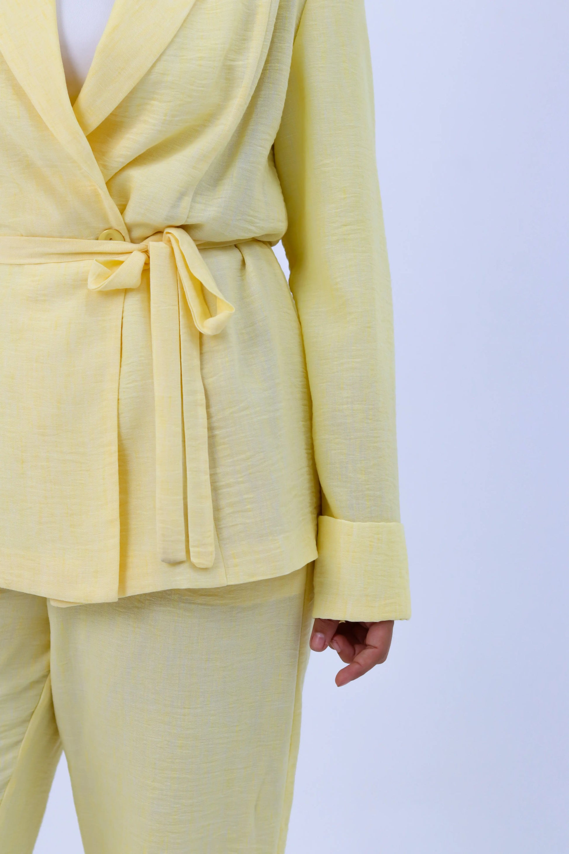 Yellow Roe Suit by THT GIRL, a stylish fashion ensemble featuring a fitted yellow suit with sleek design details.