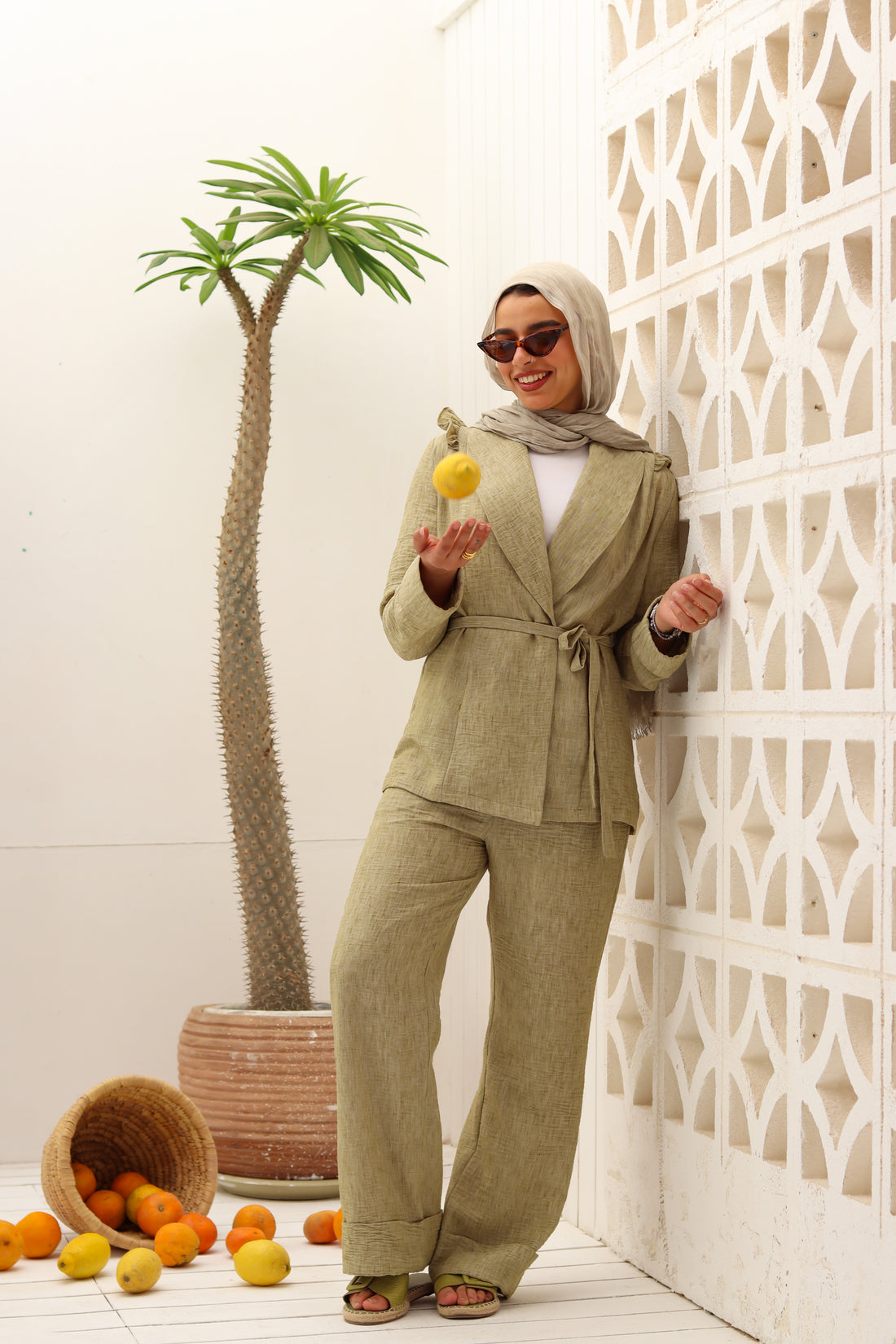 Olive Roe Suit by THT GIRL, stylish fashion ensemble featuring a tailored blazer and matching pants on a model.
