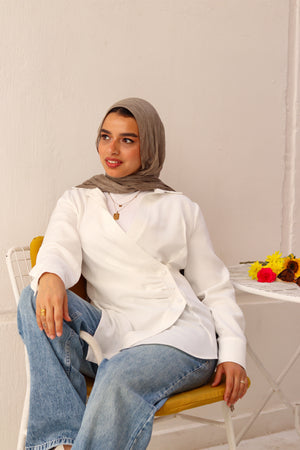 White deer print shirt by THT GIRL featuring a casual fit and classic collar, displayed on a hanger.