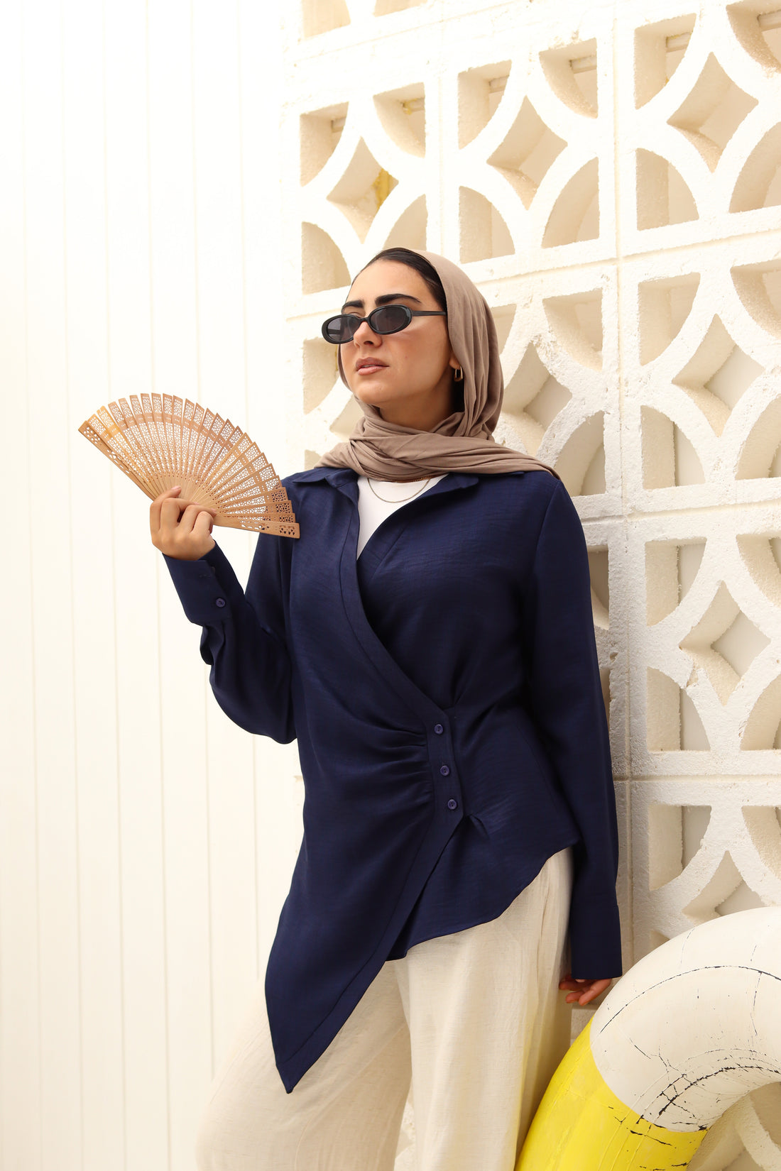 Navy blue deer print shirt by THT GIRL featuring a casual fit and stylish design, displayed on a hanger.