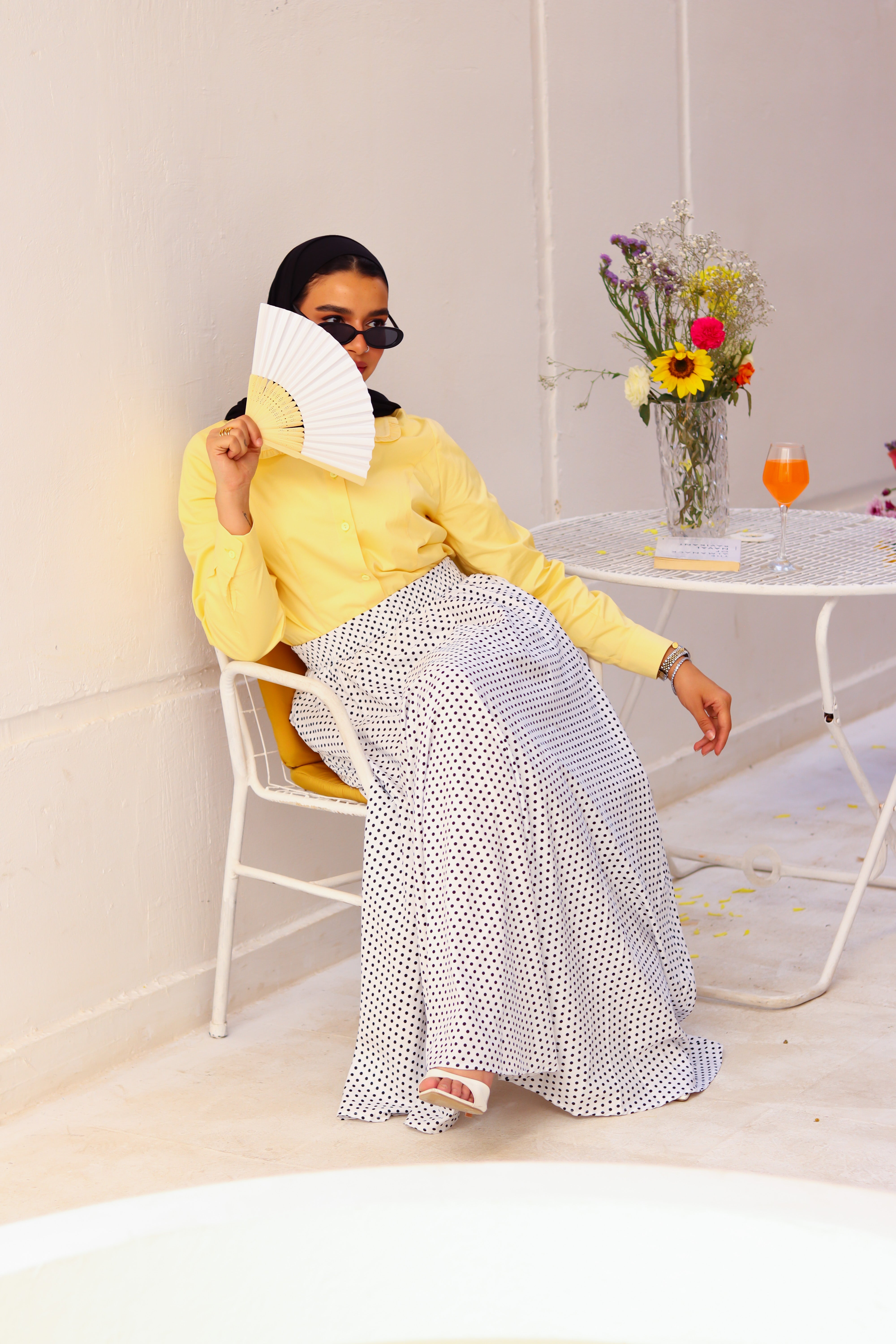 Yellow Paris blouse by THT GIRL featuring short sleeves and a lightweight summer fabric, displayed on a hanger.