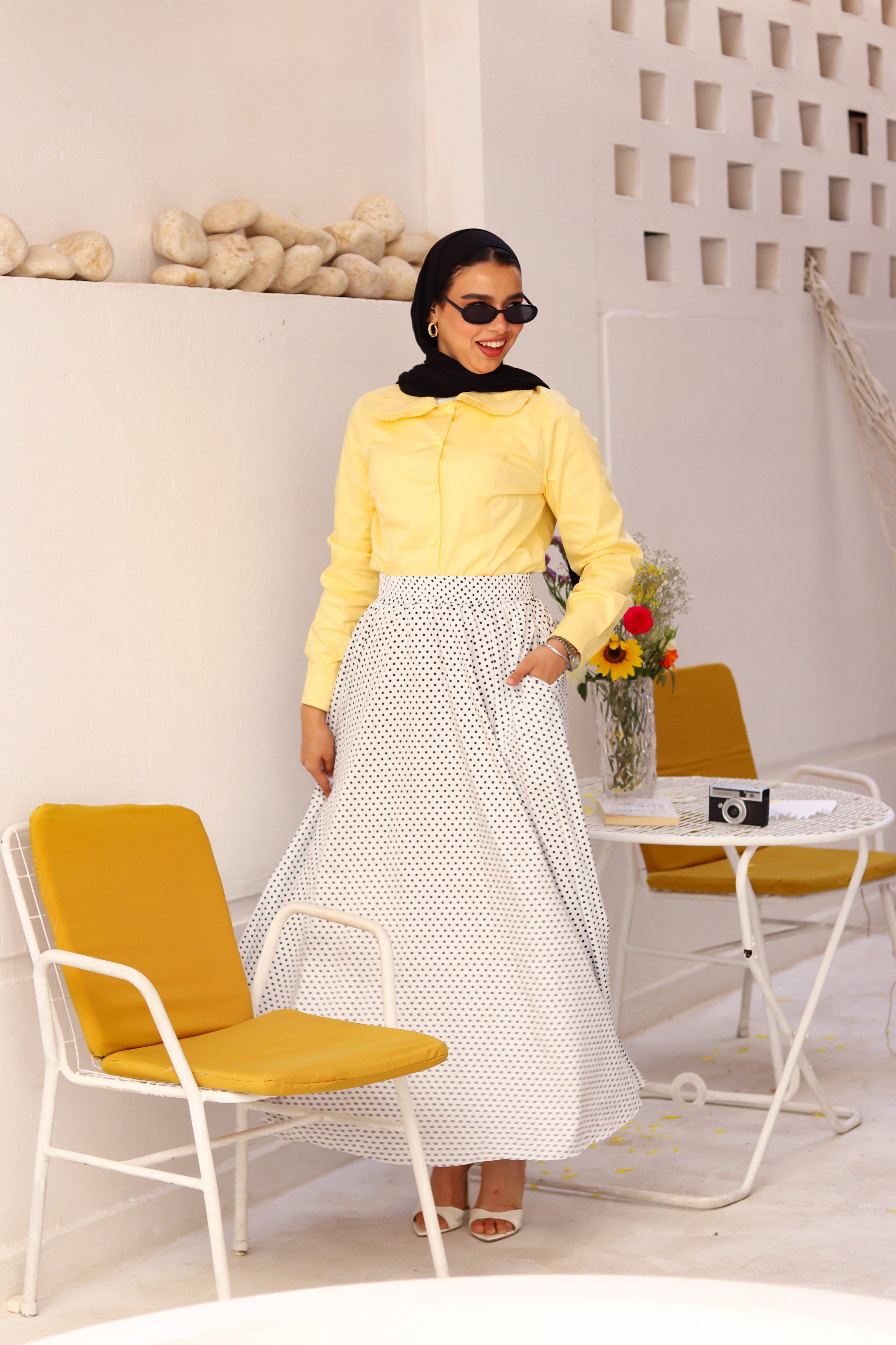 Yellow Paris Blouse by THT GIRL, lightweight summer blouse with a stylish design, shown on a hanger.
