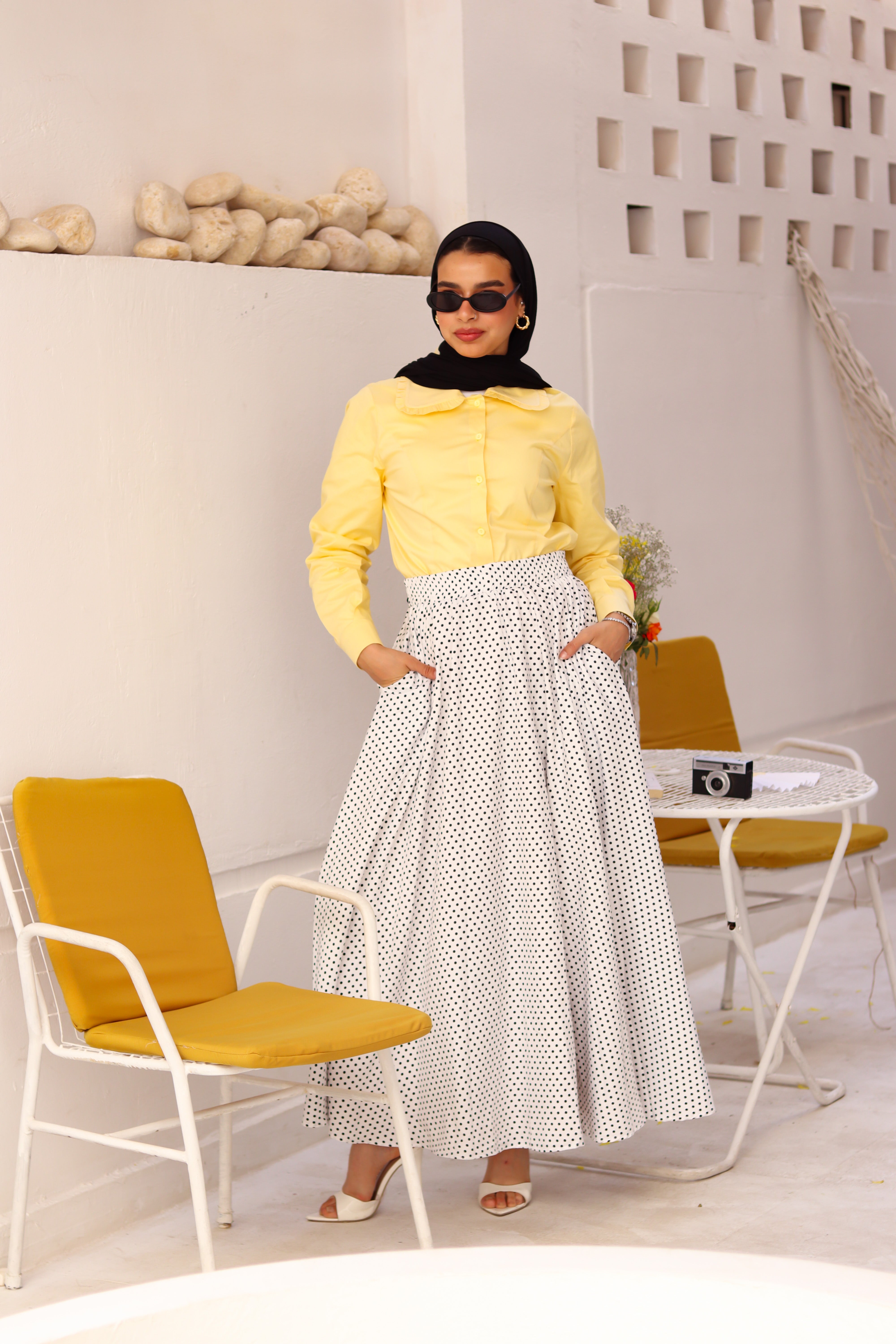 White Riviera skirt paired with a stylish THT GIRL blouse, displayed on a clean background.