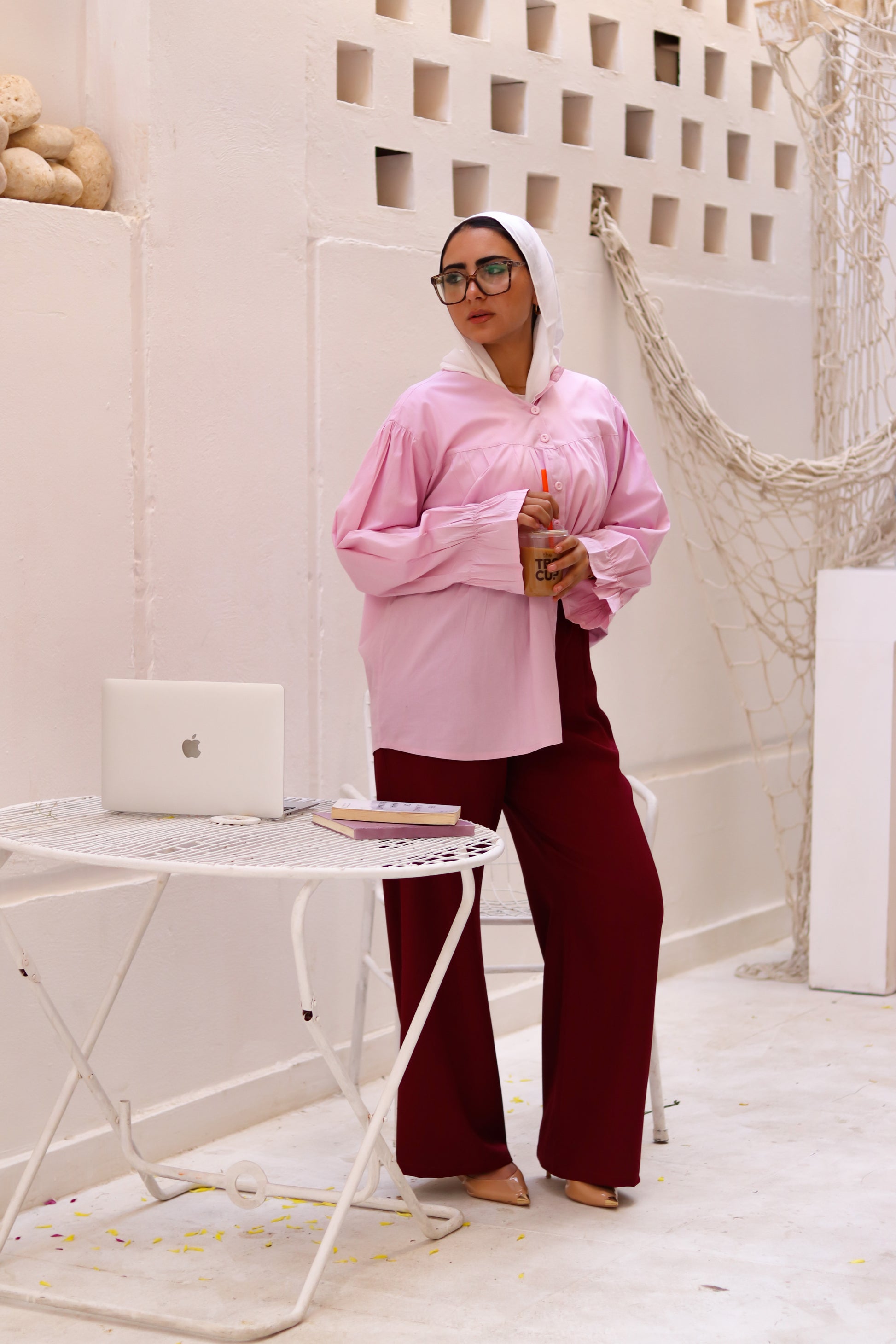 Baby pink THT GIRL Lady Blouse displayed on a hanger with soft fabric and elegant design.