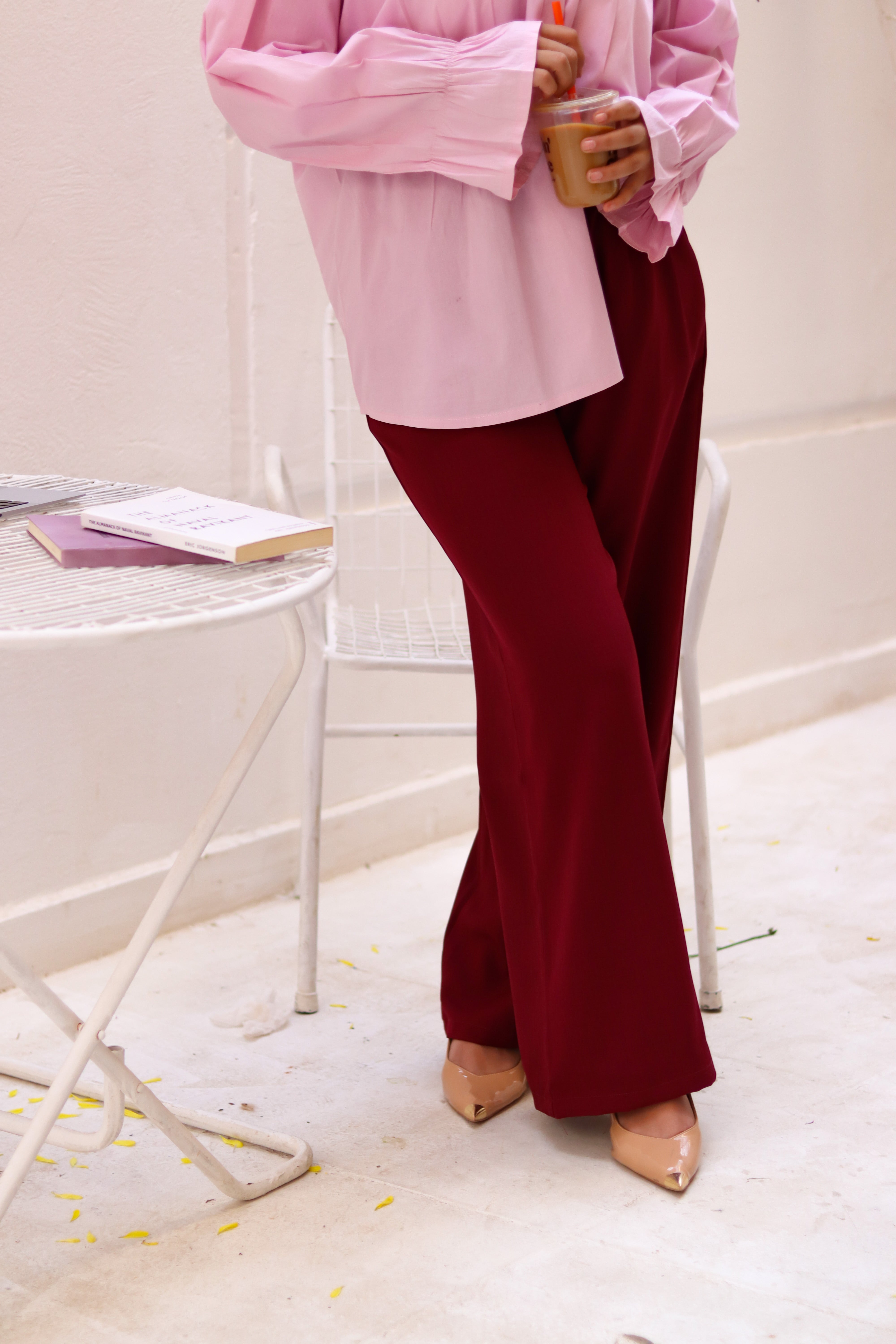 THT GIRL loose burgundy pants with a relaxed fit, featuring soft fabric and stylish design, shown on a model.