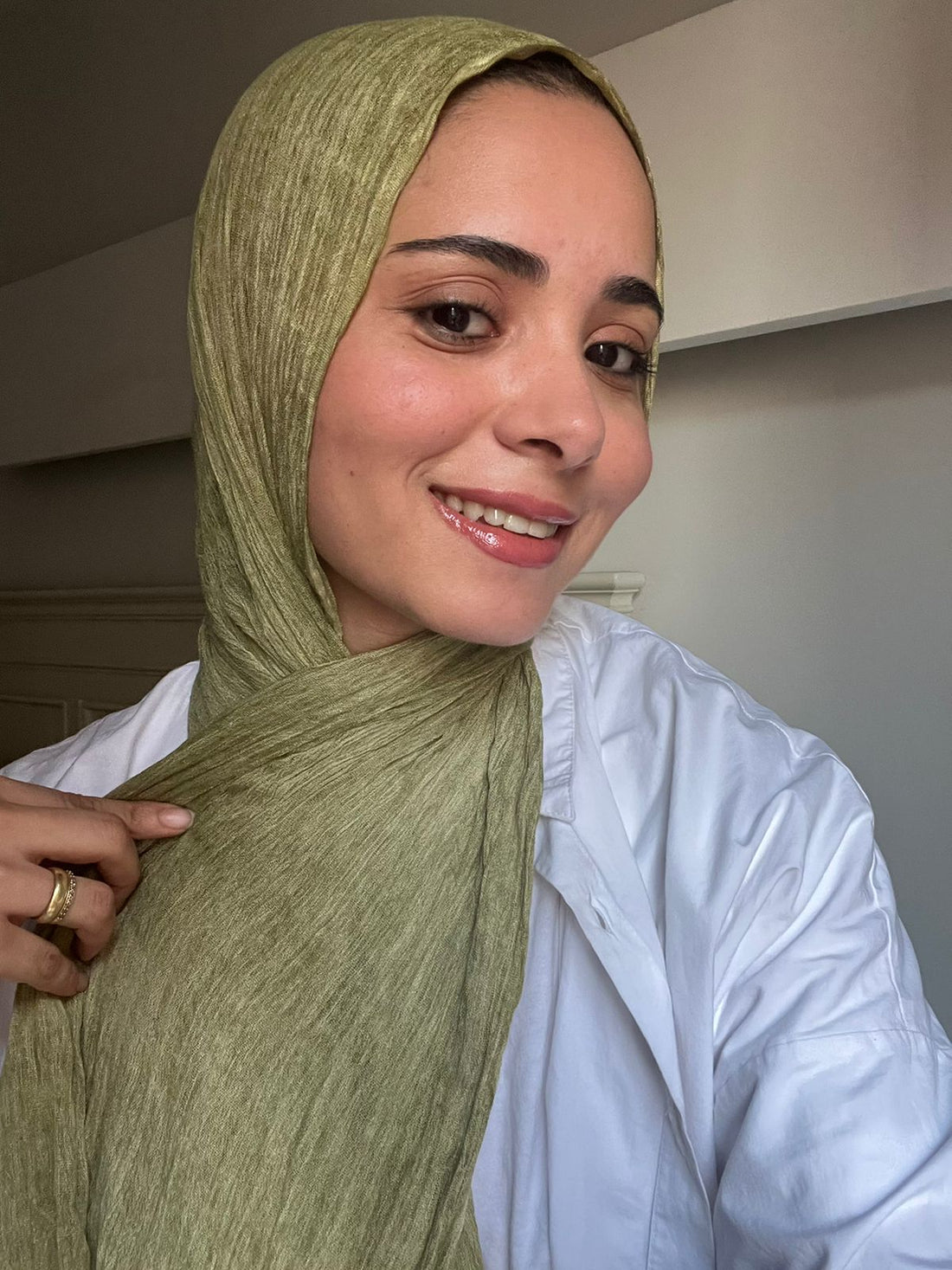 Olive-colored Ready To Go Hijab by THT GIRL, lightweight and stylish hijab displayed on a neutral background.