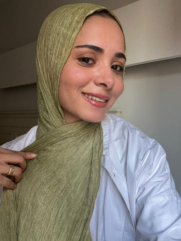 Olive-colored Ready To Go Hijab by THT GIRL, lightweight and stylish hijab displayed on a neutral background.