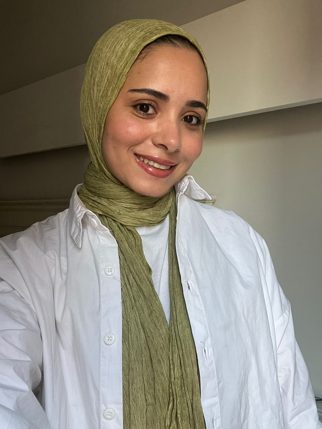 Olive-colored Ready To Go Hijab by THT GIRL, lightweight and stylish hijab displayed on a neutral background.